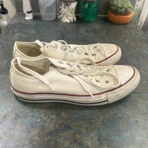 Converse Low Top Sneakers in Off-White with Red and Black Stripe